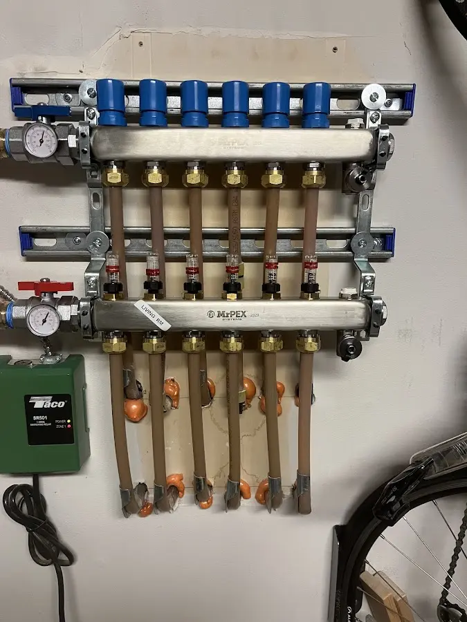 Plumber performing Gas Line Installation at a residential property in South Riding